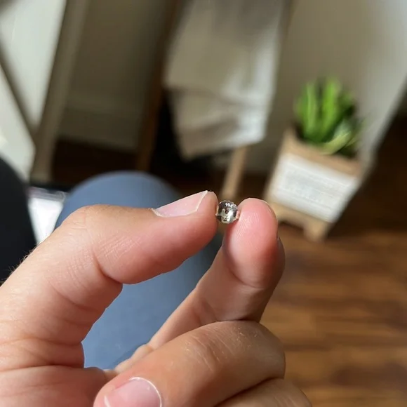 1/10 Ct. Diamond 10k White Gold Bezel Stud Earrings - Picture 6 of 10